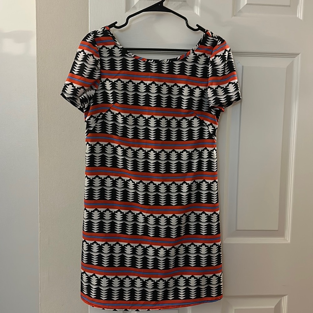 Francesca’s short sleeve pattern mini with low back